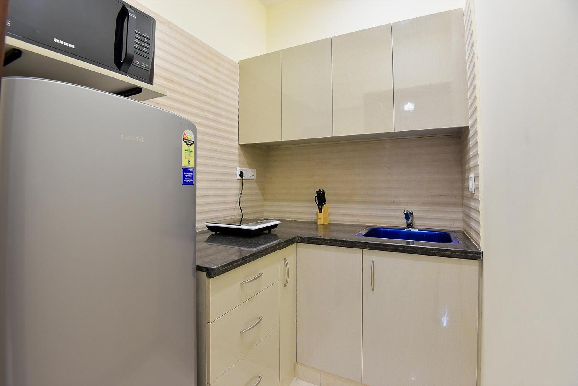 Olive Service Apartments - Golf Course Road Ґурґаон Номер фото